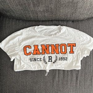 Graphic, white crop. Size medium but fits small.
